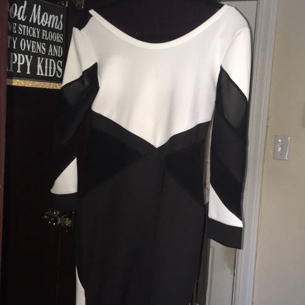 Black and white long sleeve knee length dress